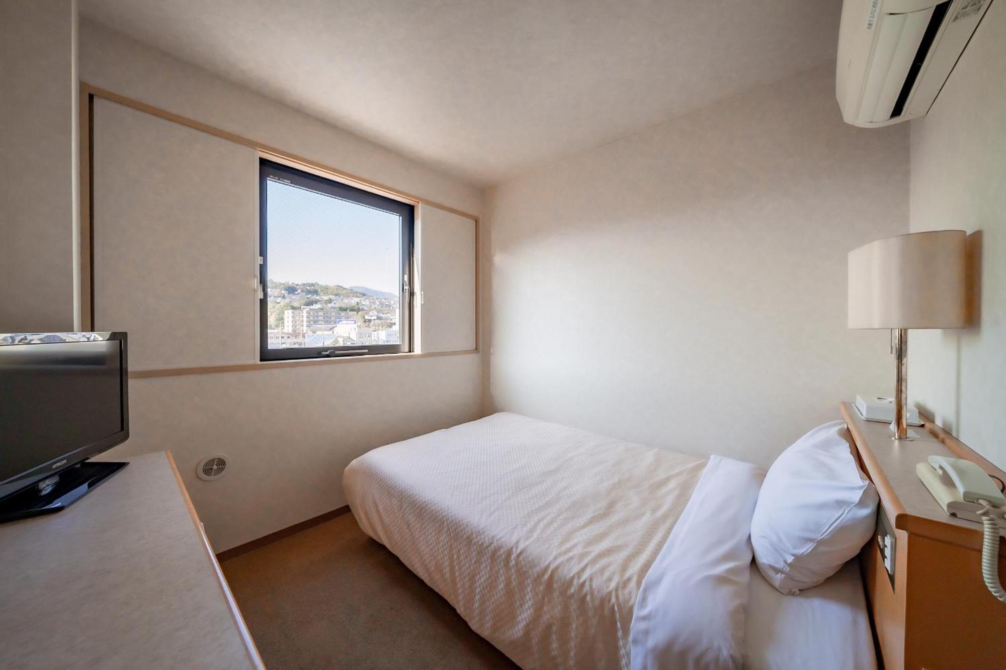 Business Hotel Kg Ойта Екстер'єр фото