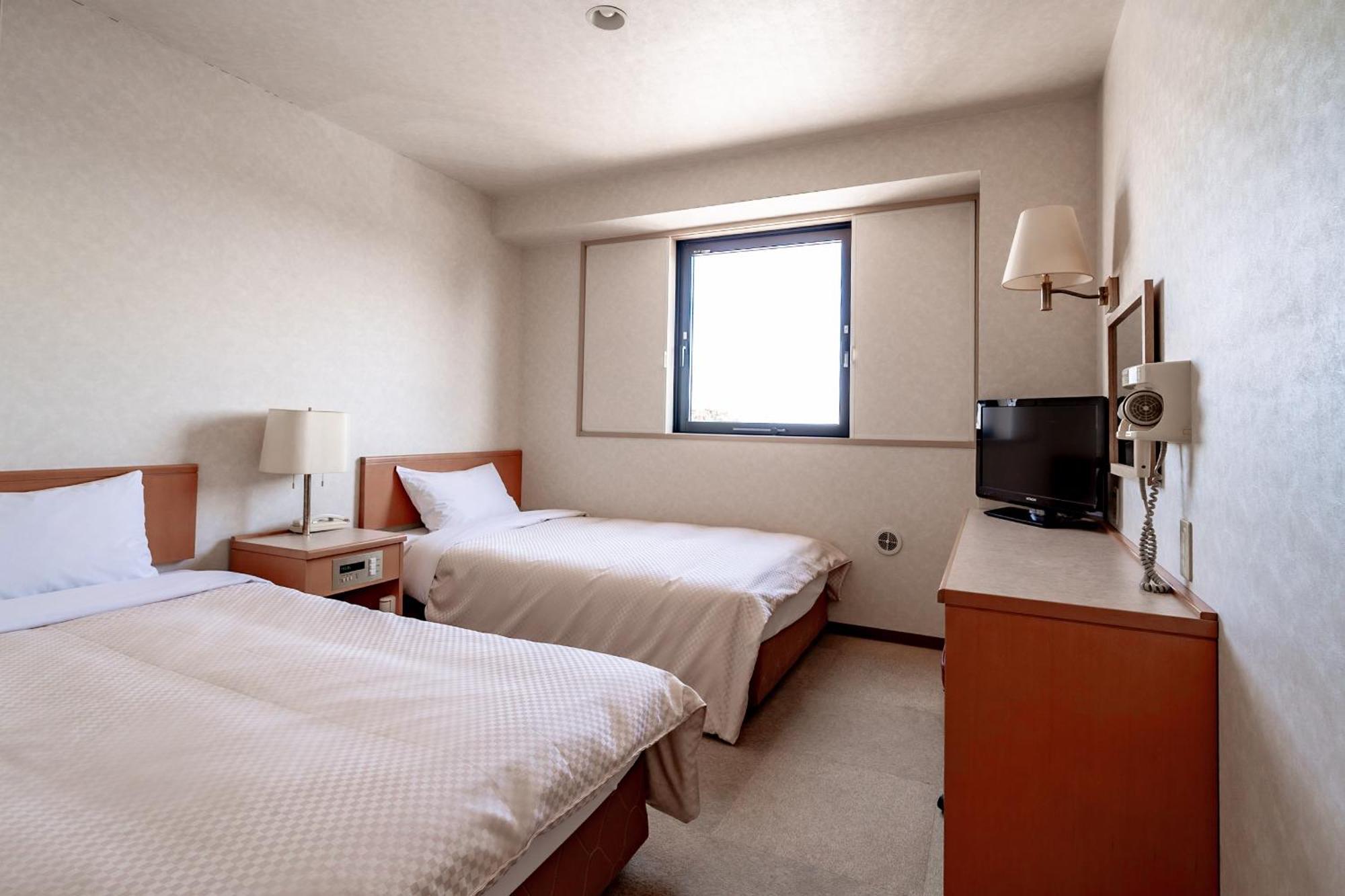 Business Hotel Kg Ойта Екстер'єр фото