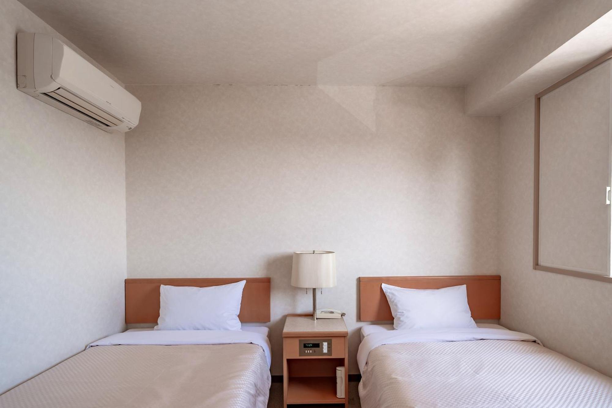 Business Hotel Kg Ойта Екстер'єр фото