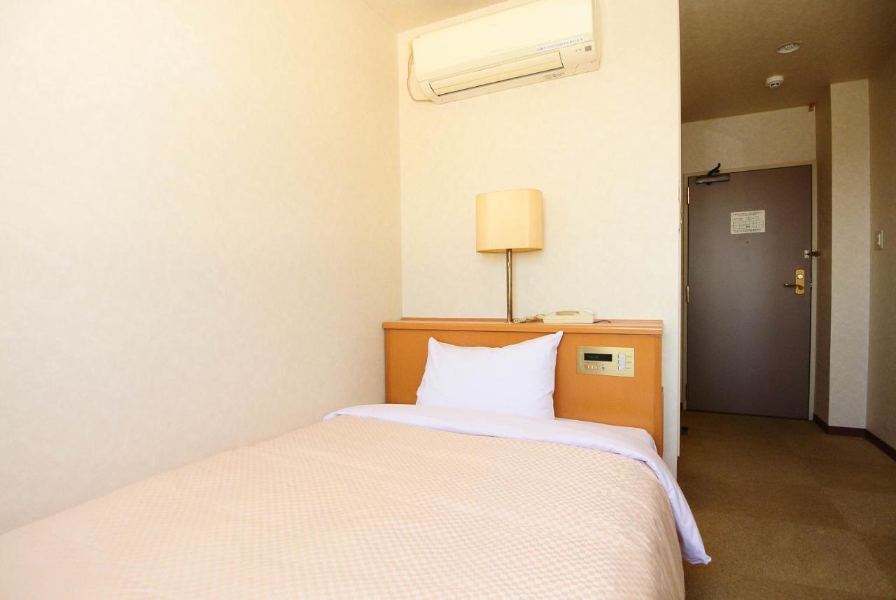 Business Hotel Kg Ойта Екстер'єр фото