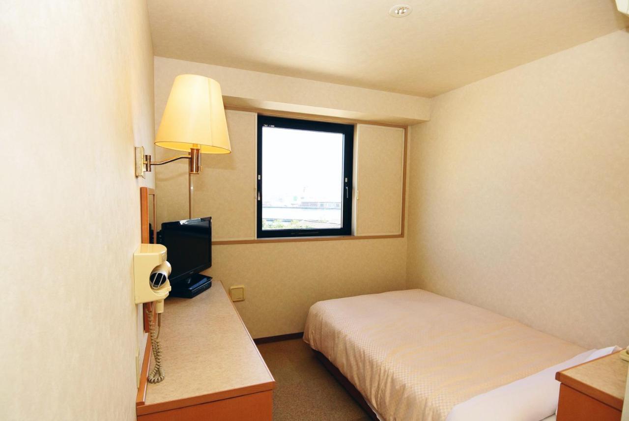 Business Hotel Kg Ойта Екстер'єр фото